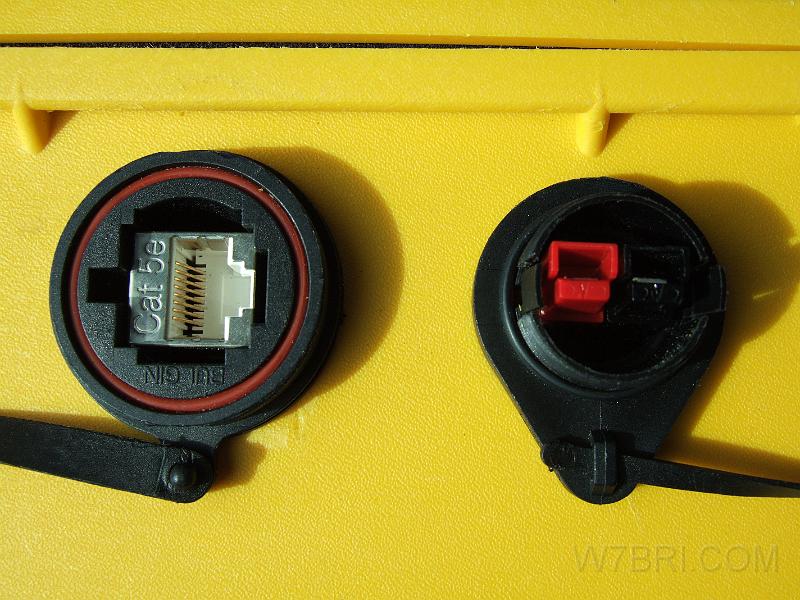 Console and PowerPole jacks.jpg - On the left is a close up of the    Bulgin PX0833    CAT5e shielded coupler for my D710A's console.   On the right, I put a set of    Anderson PowerPoles    through a    Bulgin PX0802    panel mount connector.  After looking in vain for a good sealant / adhesive to fill the gap around the PowerPoles and hold them in place, I decided to try something else.  I'm very happy with the result.  See the following three pictures. 