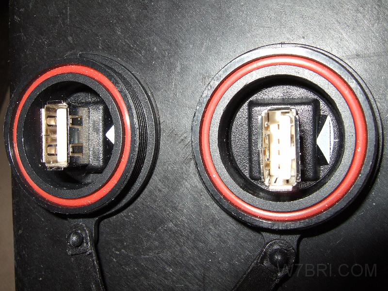 USB charging jacks.JPG - After I removed the two Bulgin CAT5e shielded couplers from my old 1300 Radio Pack, I had two big holes in the case.  Luckily,    Bulgin's PX0842    USB jacks were slightly larger than the couplers -- so, after a little Dremeling, they fit perfectly.  Each jack is capable of providing 5V / 1A USB charging power.