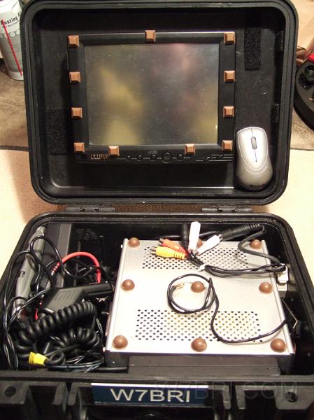 Top & bottom.JPG - Here's the prototype of my 1400 PC Pack.  It contains a mini-ITX PC, 8 inch Lilliput monitor, AnyCom USB250 bluetooth adapter, bluetooth keyboard / mouse and eSATA hard drive in a rugged Addonics enclosure.  The drive can be easily removed to ensure the data is not stolen even if the rest of the pack is. The pack is powered via DC vs AC to take better advantage of mobile deployment. TO DO: I'm going to cut the cables to reduce clutter and drill some holes for RJ45, USB, etc. ports.  More / updated pictures coming soon!  