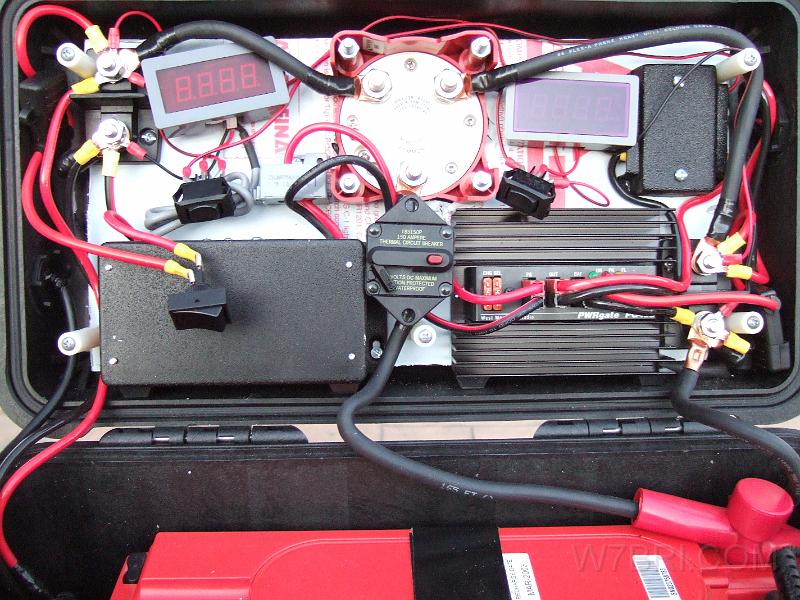 lid #1.JPG - From left to right...   TOP :  ATC fuse holder,    PowerPost   ,    shuntless ammeter    (plus switch and open loop current sensor),    battery switch   ,    volt meter   ,  (plus switch),    DualBus busbar   , DC out bulkhead.  BOTTOM :  AC in bulkhead,    N8XJK Marine Booster    (plus switch),    circuit breaker   ,    PWRgate battery charger   ,    PowerPost   , ATC fuse holder. 